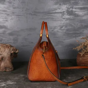 Vintage genuine leather shoulder bag for women, retro brown top layer cowhide handbag.