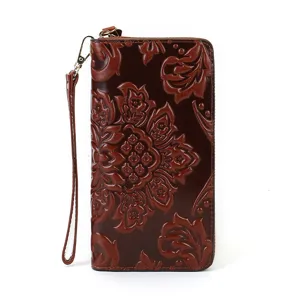 Vintage genuine leather long wallet for women embossed floral zip clutch with wrist strap.