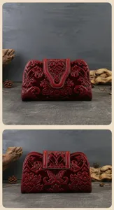 Vintage embossed leather evening clutch bag for women, elegant red banquet handbag.
