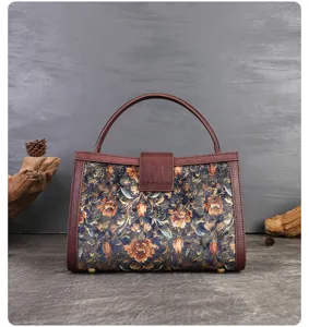Vintage floral handbag with leather trim, elegant top handle bag for women daily retro style.