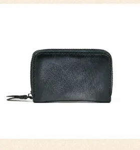 Detailed view of the genuine leather mini zipper card holder in grey, soft vintage texture.