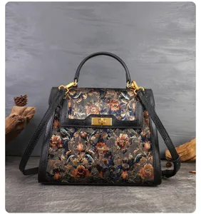 Vintage floral embroidered leather handbag, elegant top handle shoulder bag for women.