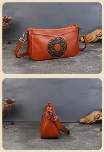 Sac bandoulière vintage en cuir véritable pour femme avec motif floral mandala en relief marron.