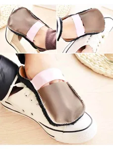 Detail view of portable shoe polishing glove, soft plush cleaning cloth for footwear.