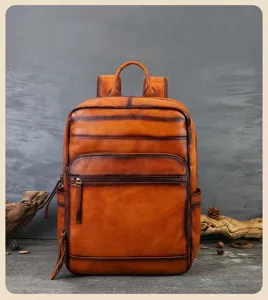 Vintage genuine leather backpack for men women, handmade brush-color casual travel school daypack.