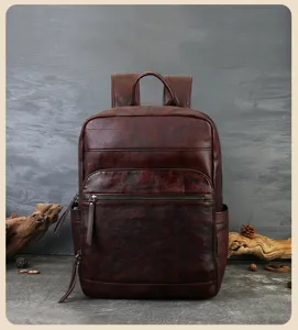 Retro brown cowhide leather backpack texture and metal zipper detail showing fine craftsmanship.