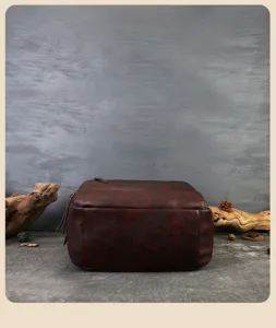 Retro genuine top layer cowhide leather backpack detail shot, hand-stained casual travel bag.