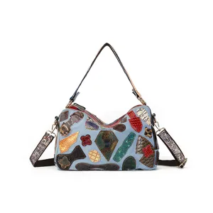Retro patchwork denim shoulder bag, stylish genuine cowhide leather pillow bag for women daily.