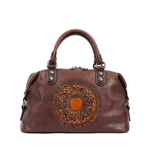 Vintage embossed leather tote bag for women, large capacity casual handbag with stylish totem.
