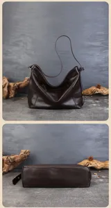 Detailed view of the dark brown leather hobo bag showcasing its texture and bottom structure.