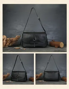 Detailed view of black genuine leather vintage messenger bag, showing texture and hardware.