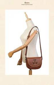 Vintage genuine leather saddle bag for women, retro studded crossbody shoulder bag with gems.