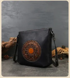 Retro totem embossed genuine leather women shoulder bag, vintage black cowhide underarm bag.