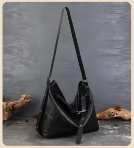 Black genuine leather hobo shoulder bag, large capacity retro commuting tote for women.