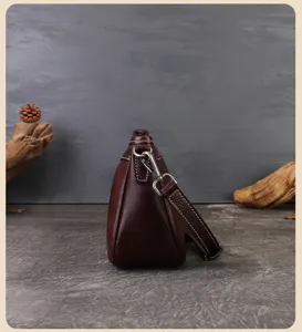 Retro dark brown top-layer cowhide leather underarm shoulder bag, versatile elegant baguette bag.