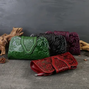 Vintage embossed leather evening clutch bag for women, elegant retro banquet handbag showcase.