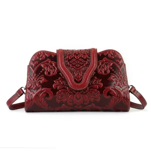 Vintage embossed leather shoulder bag, elegant wine red evening handbag for women.
