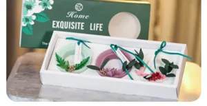 Aromatherapy wax tablet gift box set with floral decor for wardrobe and home use.