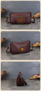 Vue detaillee du sac a epaule en cuir avec motif mandal antique et finitions raffinees.