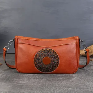 Sac à bandoulière sous les bras en cuir véritable gaufré vintage pour femmes.