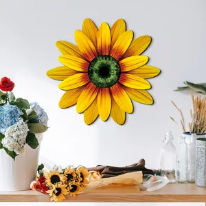 Creative wooden sunflower wall hanging with green eye center home decor background aesthetic art.