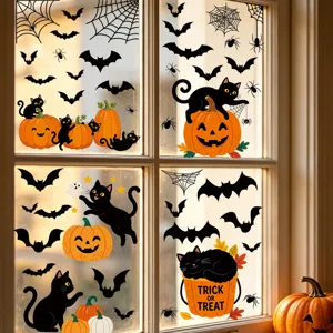 Halloween window stickers detail showing black cats, bats, pumpkins and spooky spider webs.