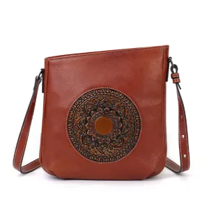 Vintage embossed leather shoulder bag for women, brown casual crossbody bag with mandala pattern.