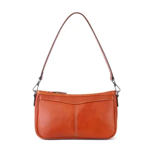 Vintage genuine leather shoulder bag for women, stylish underarm baguette bag, versatile brown.