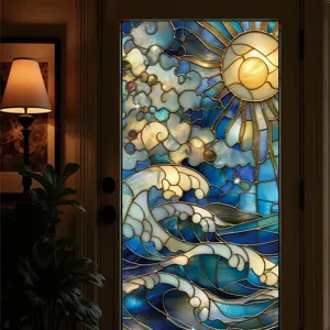 Stained glass window film detail showing ocean waves, sun and clouds design for home glass decor.