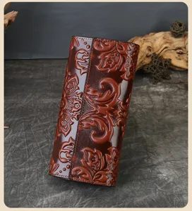 Premium genuine leather embossed long trifold wallet for women with large capacity clutch.
