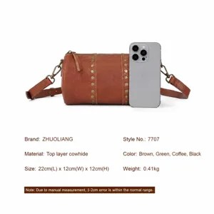 Vintage genuine leather barrel bag with metal studs, chic cylinder crossbody shoulder bag.