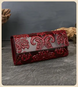 Embossed genuine leather long wallet detail view, vintage floral pattern, wine red clutch purse.