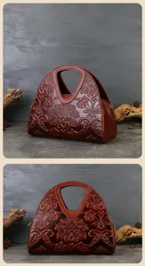 Vintage embossed leather handbag detail view, elegant cutout handle design, premium tote bag.