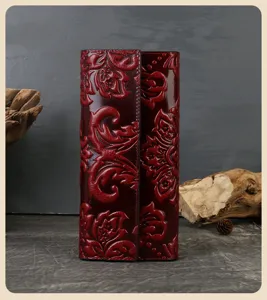 High-end genuine leather embossed long trifold wallet for women, elegant Chinese style.