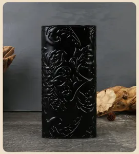 Black genuine leather long wallet for women with embossed floral design and multiple card slots