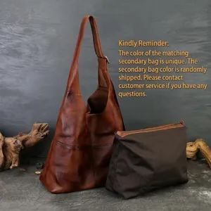 Retro large capacity genuine leather tote shoulder bag for women with wide strap.