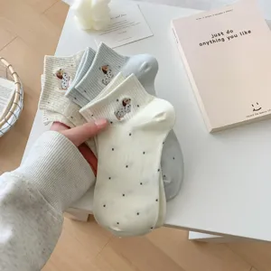 Detailed view of cute Japanese style embroidered dog polka dot cotton women socks summer
