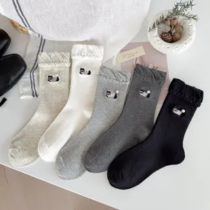 Cute cartoon dog embroidered mid-calf socks for women, cozy cotton knit hosiery.