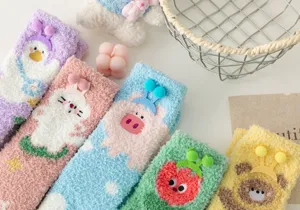 Cozy coral fleece winter socks with cute cartoon animal designs and soft plush warm floor feel.