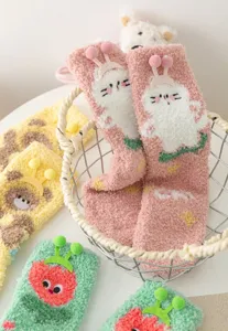 Cute plush coral fleece socks with 3D cartoon animal designs, thick warm mid-tube home socks for winter.