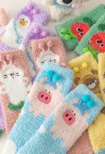 Cozy coral fleece fuzzy socks featuring cute 3D cartoon animal designs, warm winter sleep floor socks.