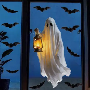 Detailed view of Halloween ghost and bat window stickers, creating a spooky festive atmosphere.