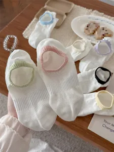 Breathable cotton low-cut boat socks for women with colorful cuffs and thin mesh design.