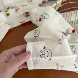 Cute white mid-calf socks with adorable cartoon animal prints and letters for daily wear.