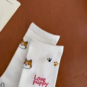 White cute cartoon corgi print mid-calf socks detail shot, soft knitted fabric daily wear.