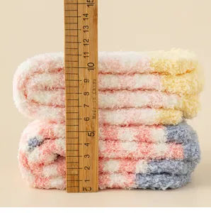 Fluffy coral fleece socks for women, thick warm checkerboard sleep socks for indoor floor wear.