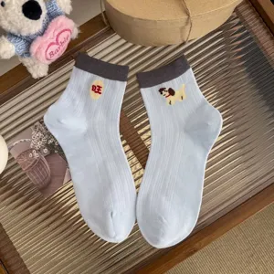 Cute blue short cotton socks for women featuring adorable puppy and Chinese character embroidery.