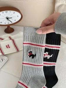 Autumn winter embroidery puppy mid tube socks Japanese cartoon fashion socks detail view.