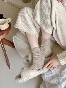 Cozy winter warm wool knitted socks for women, thick cashmere ribbed lounge floor socks detail.