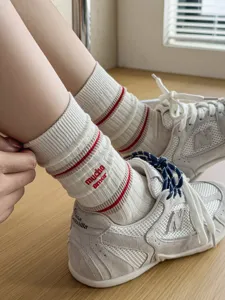 Japanese style striped mid-tube socks with cute embroidery, soft cotton slouch socks for women.
